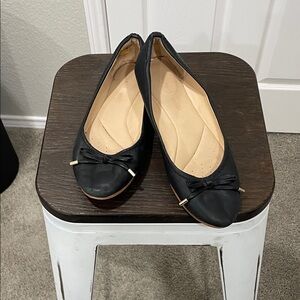 Clarks Black Leather Ballet Flats with Bow and Gold Accents